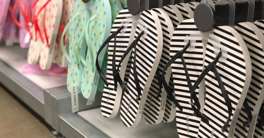 women's Old Navy flip flops on a display in store