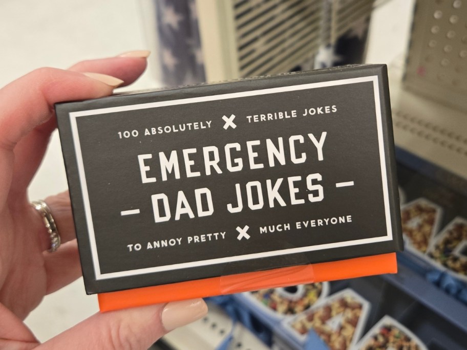 hand holding box of emergency dad jokes