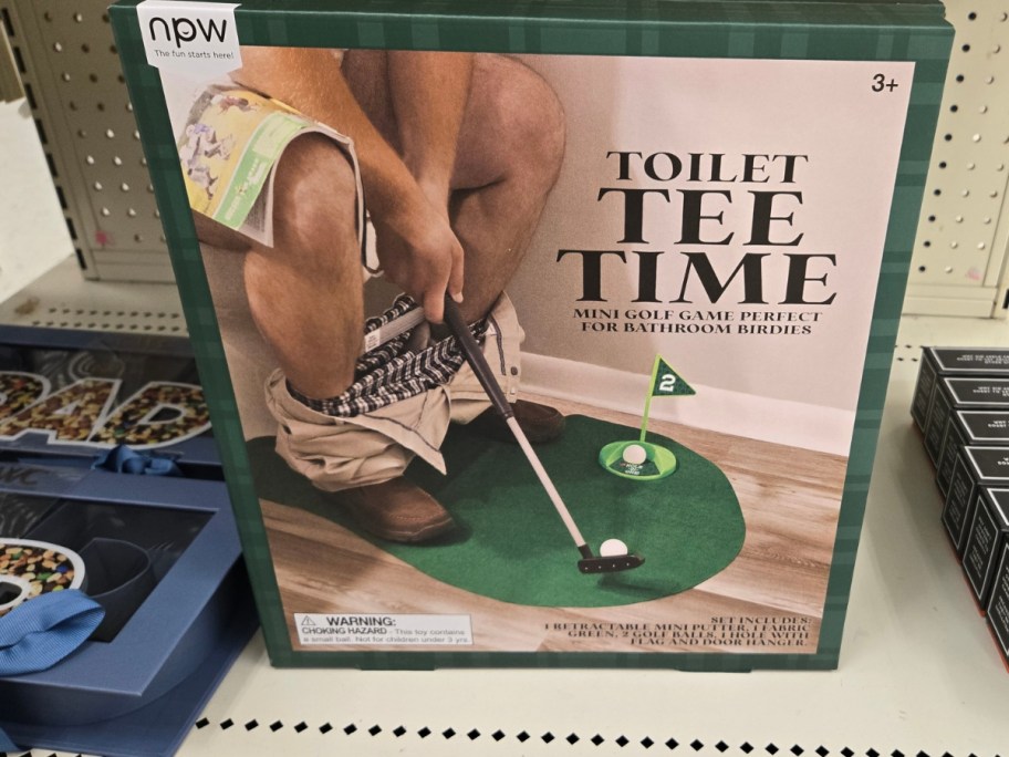 toilet tee time game on store shelf