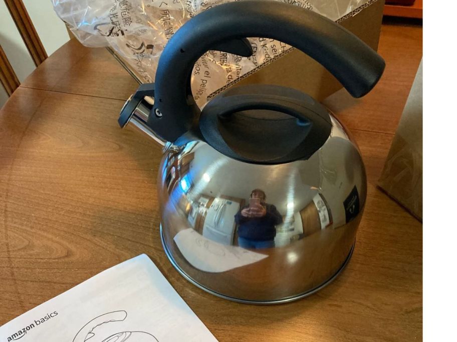 An Amazon basics Tea Kettle on a table