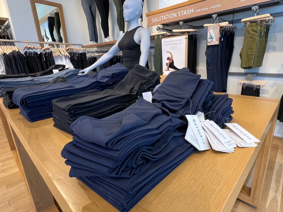 display table of leggings in store