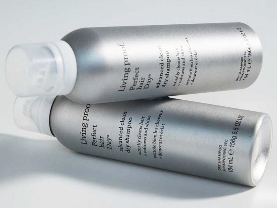 two silver bottles of Living Proof Advanced Clean Dry Shampoo