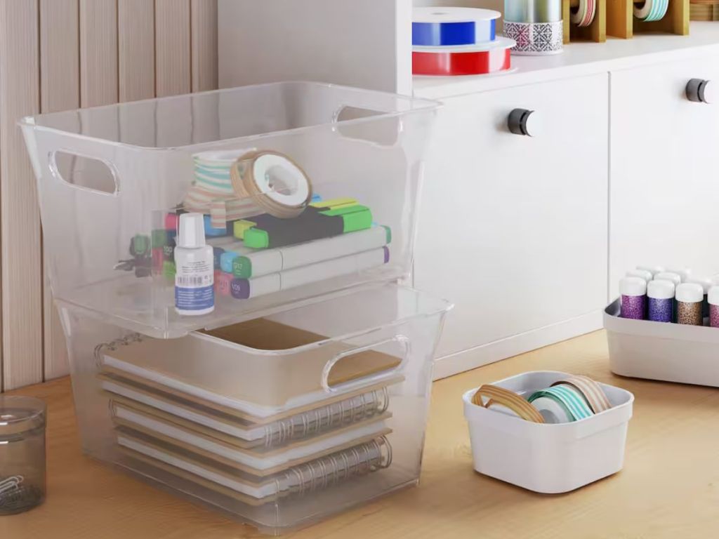 Classroom storage bins on a desk