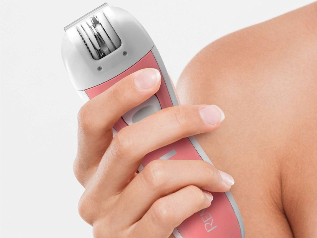 An epilator held in one hand 