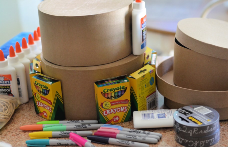 items to create a diy cake made out of school supplies