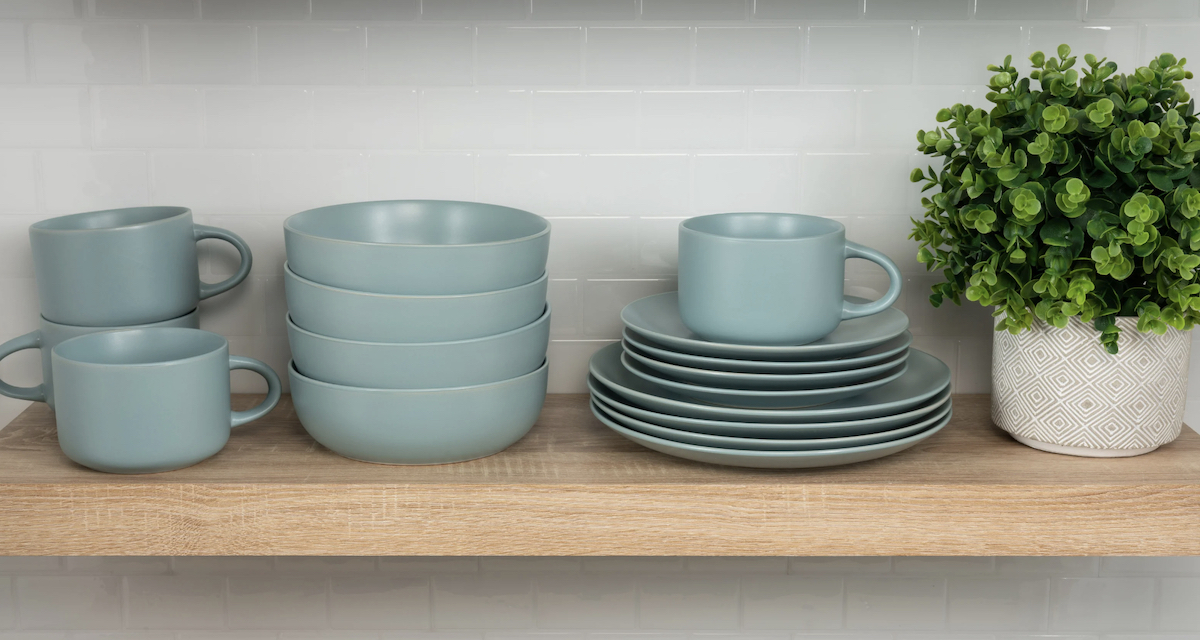 stacks of dorm decor blue dishes on wood shelf