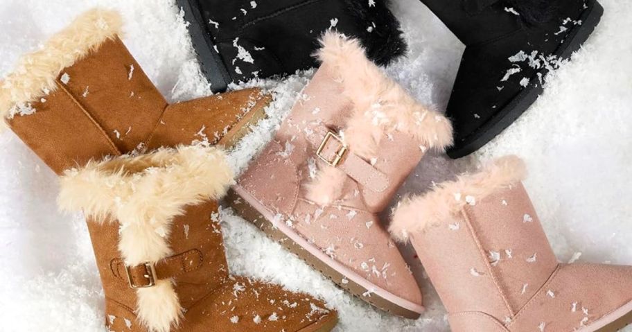 The Children's Place Girl's Warm Lightweight Winter Boot in tan, pink and black on a background of faux snow