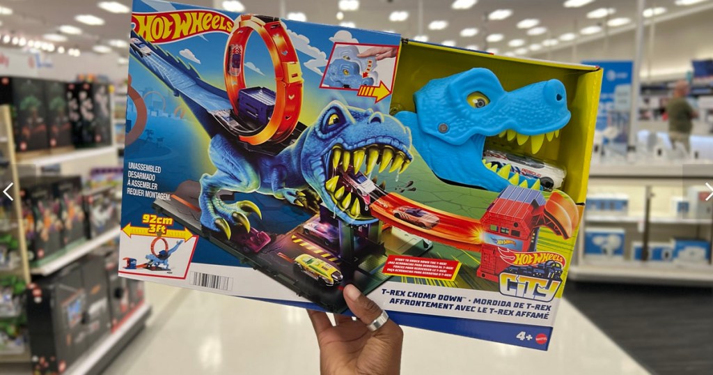 hand holding trex hot wheels set