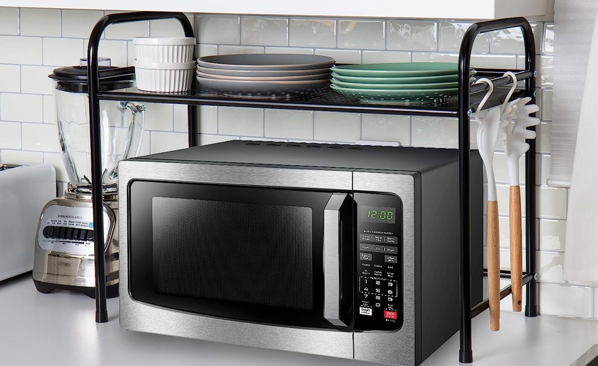 kitchen counter shelf displayed with microwave underneath it