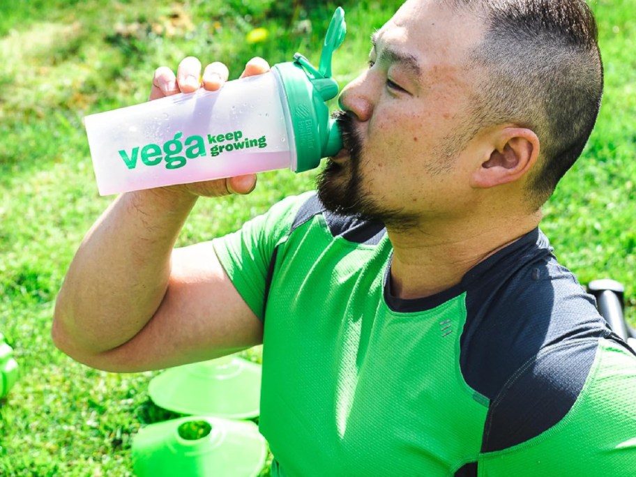 man drinking from VEGA shaking cup