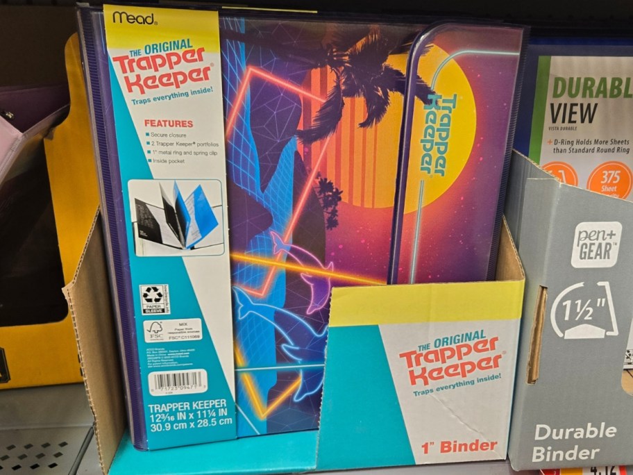 neon dolphin design Trapper Keeper on shelf at Walmart