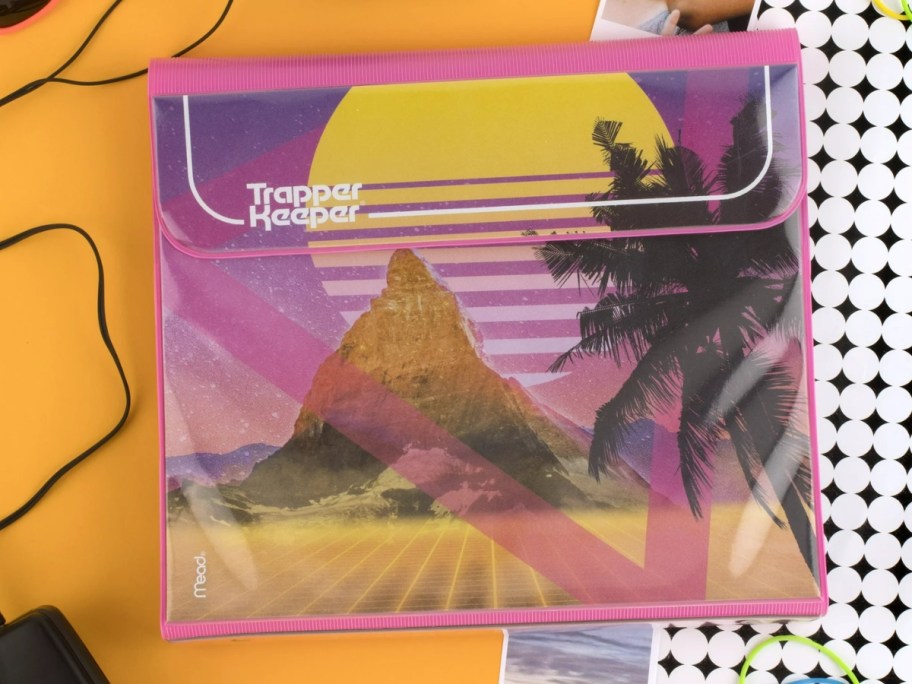 Trapper Keeper with palm tree and tropical design in bright pink, purple, yellow colors