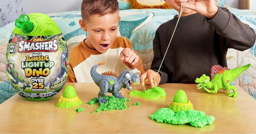 kids playing with a Zuru Smashers Mega Jurassic Light-up Dino Egg 