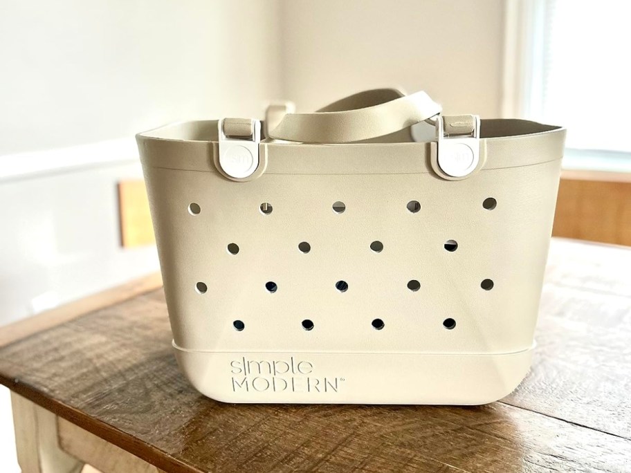 simple modern getaway tote bag in almond birch on table