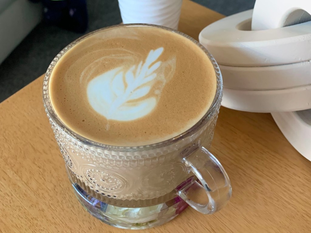 vintage coffee mug with coffee on table