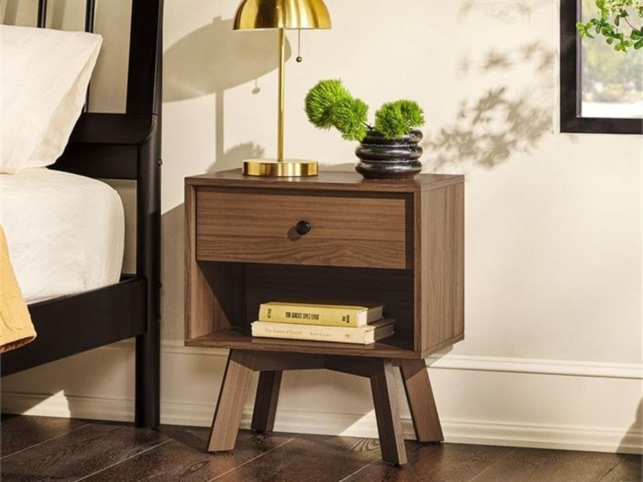 a brown mid Mid Century Modern 1-Drawer Nightstand next to bed