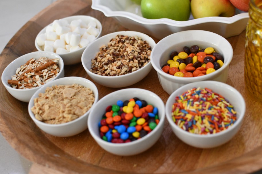 assorted toppings like nuts, sprinkles, and candy