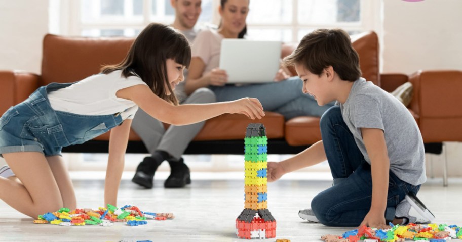 kids playing on the floor with beblox