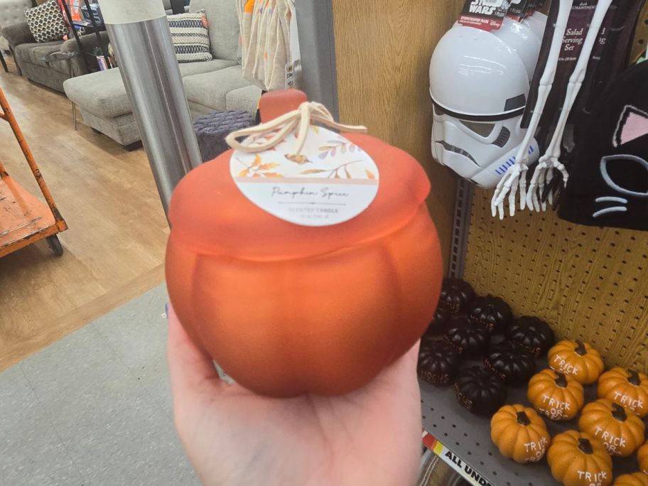 Autumn onlinefort Pumpkin Spice Scented Candle in hand in store