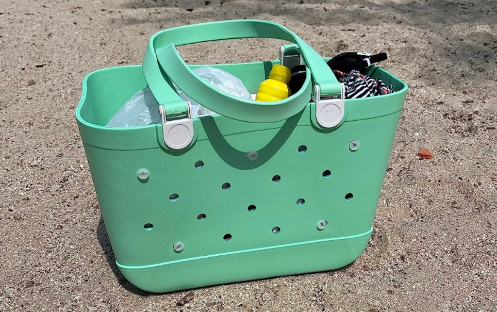 mint green simple modern tote sitting on sandy beach