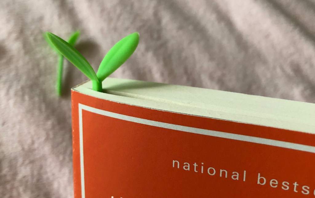 sprout bookmark onlineing out of the top of book