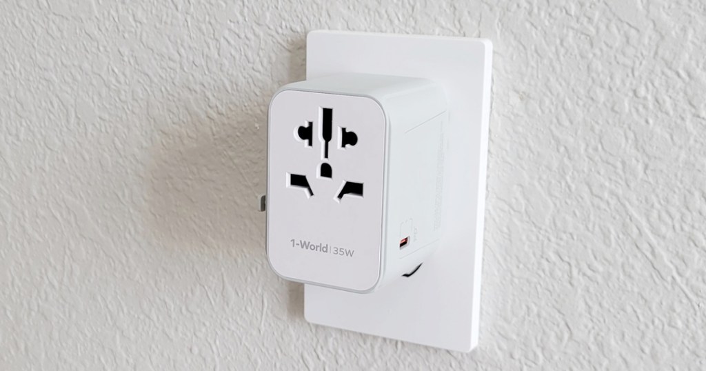 white adapter plugged into wall