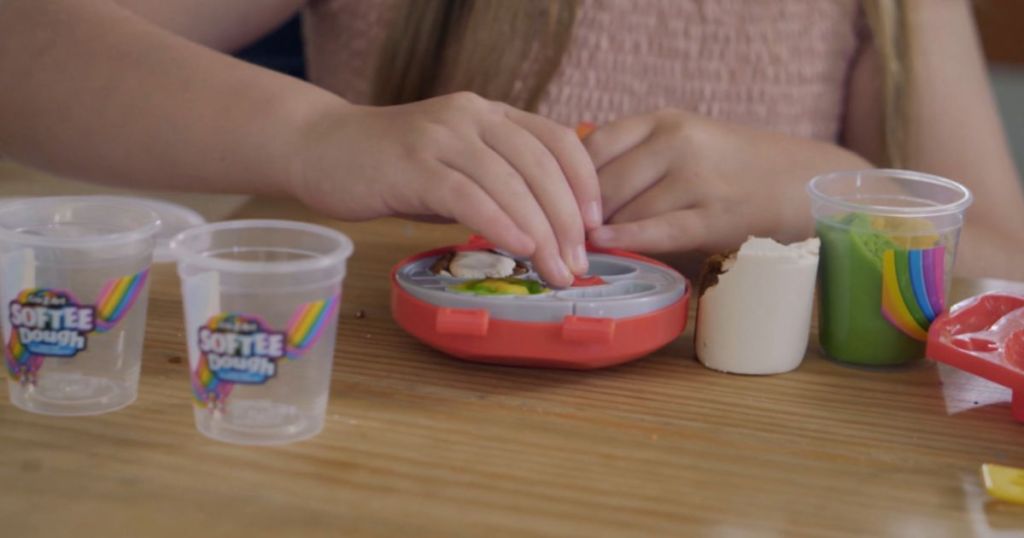 Little girl playing with a Cra-Z-Art Softee Dough Make & Mold Set