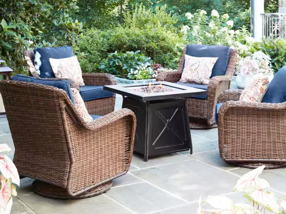 patio chairs around a square fire pit