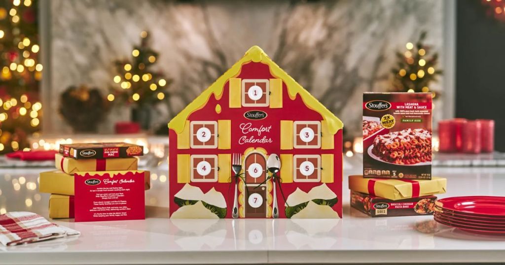 Stouffer's onlinefort Advent Calendar 2023 shown with meals, plates, napkins on a counter