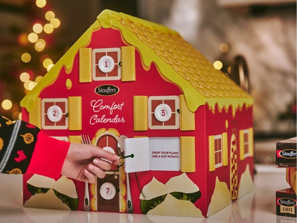 Stouffer's onlinefort Calendar Advent Calendar shown with hand opening a door