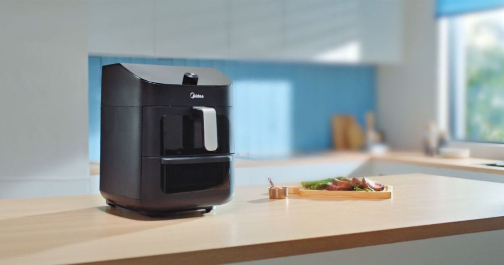 black air fryer on counter