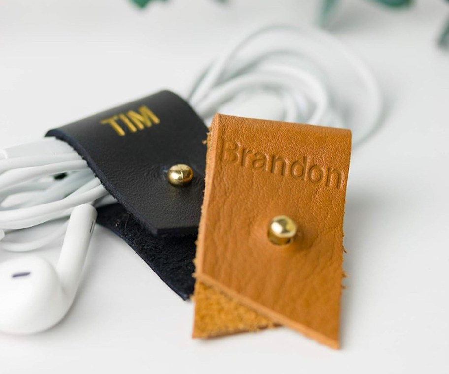 camel brown and black Personalized Leather Cable Holder on white cord headphones