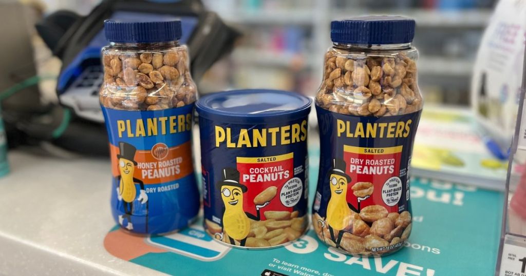 3 Jars of Planters peanuts at the register at Walgreens