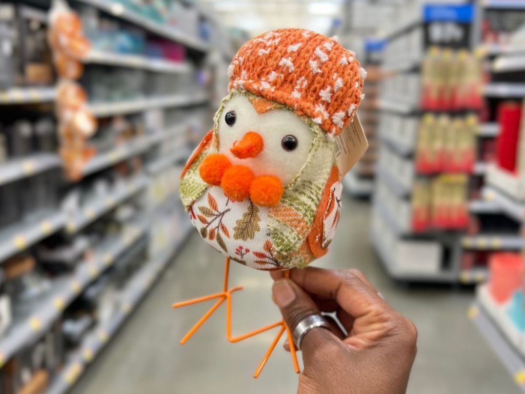 A 7" fabric bird dressed in Fall décor 