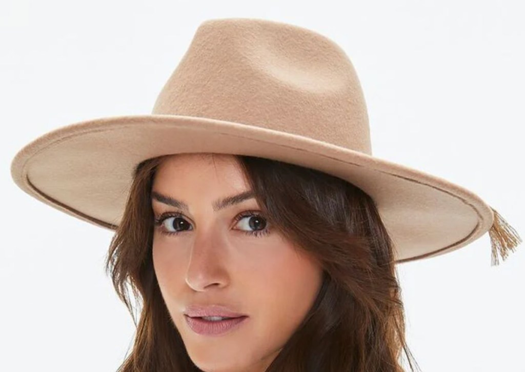 woman in beige cowboy hat