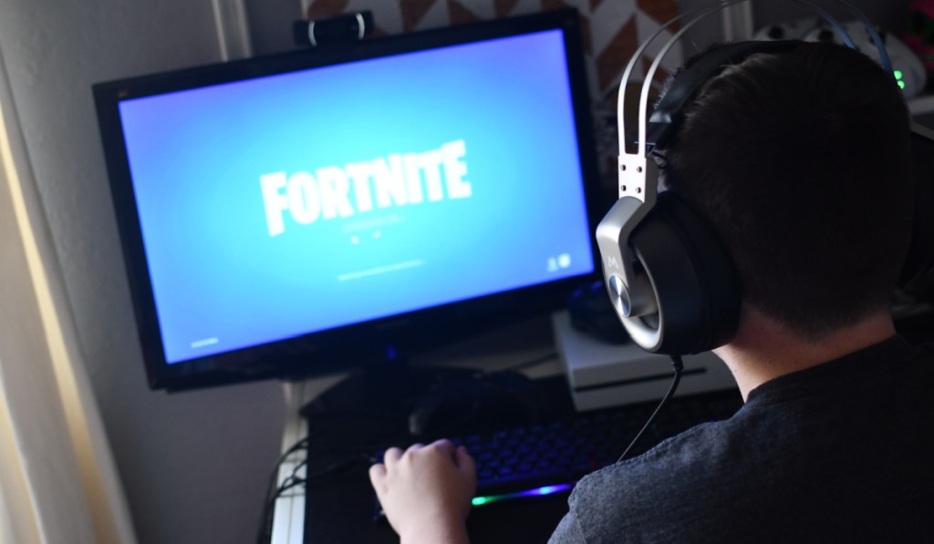 boy playing fortnite