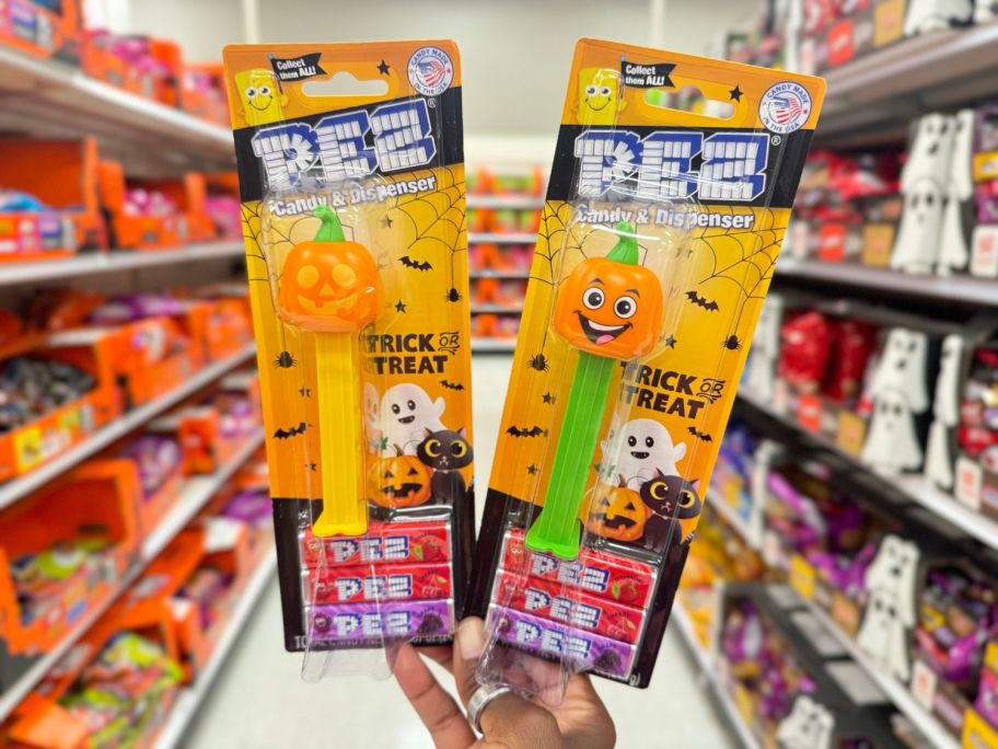 2 pez dispensers in hand in store