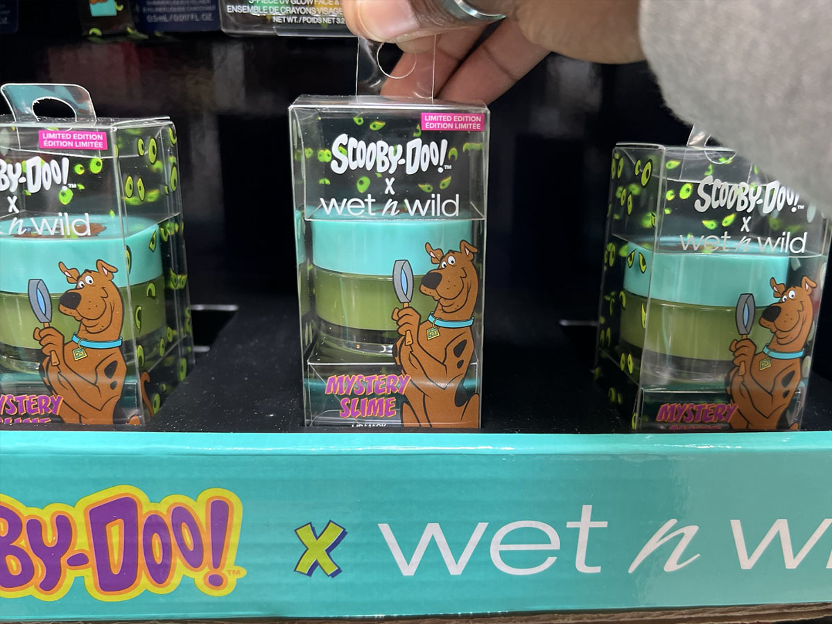 hand reaching for Wet N Wild Scooby Doo mytery slime package