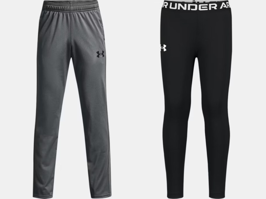 a pair of boy's grey Under Armour pants and a pair of black Under Armour girl's leggings