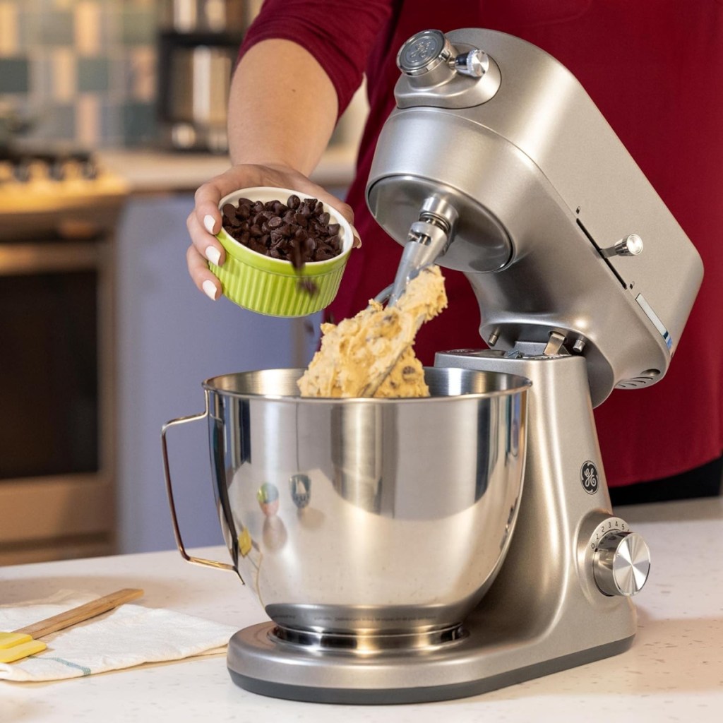 pouring chocolate chips into mixer