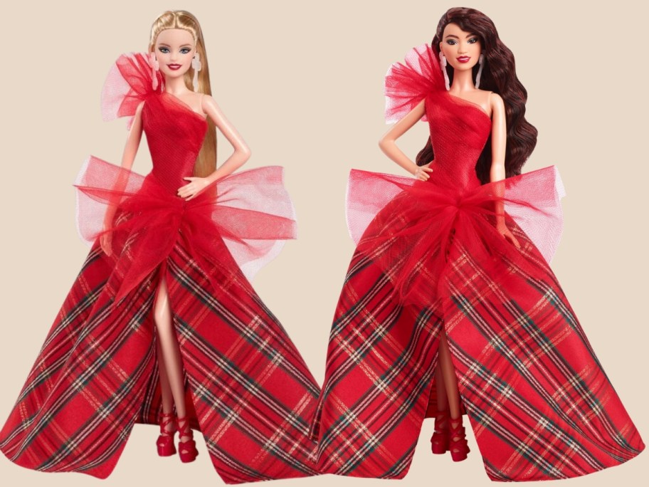 a blonde haired and brown haired Barbie doll both in a red holiday gown with a red top and red, green, and gold plaid skirt, on a gold background with snowflakes