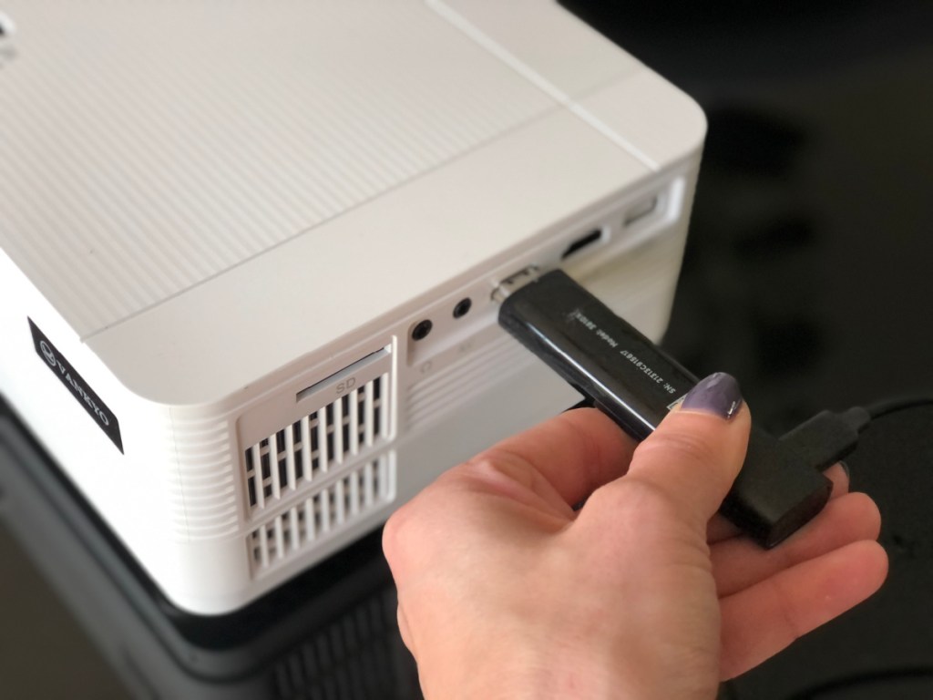 Plugging a Roku Player Stick into a projector