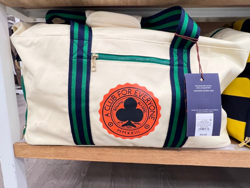 Rowing Blazers x Target Crest Logo Weekender Bag displayed on the shelf