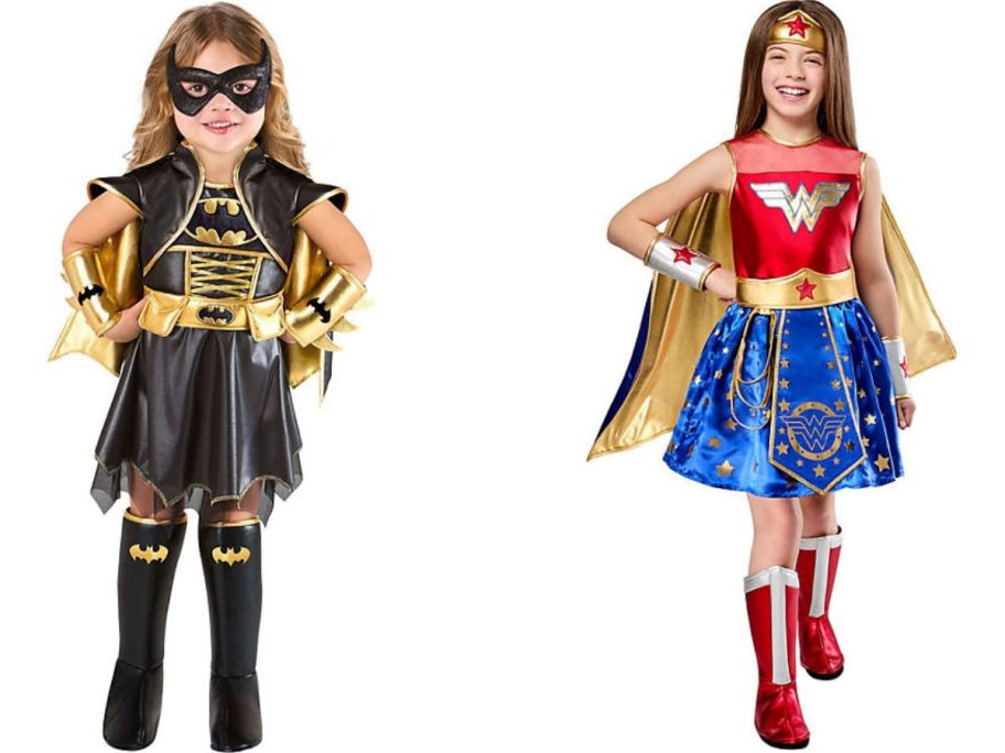 Stock images of girls wearing Batgirl and Wonder Woman Halloween Costumes