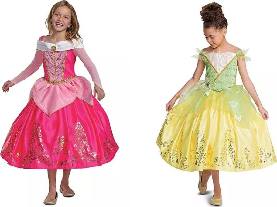 Stock images of a two girls wearing Princess Aurora and Princess Tiana Disney Costumes