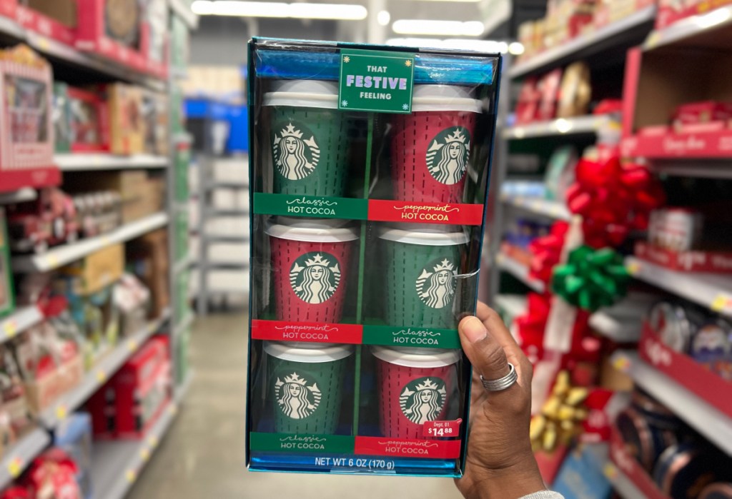 a box of starbucks christmas ornaments shaped like hot cocoa tumblers