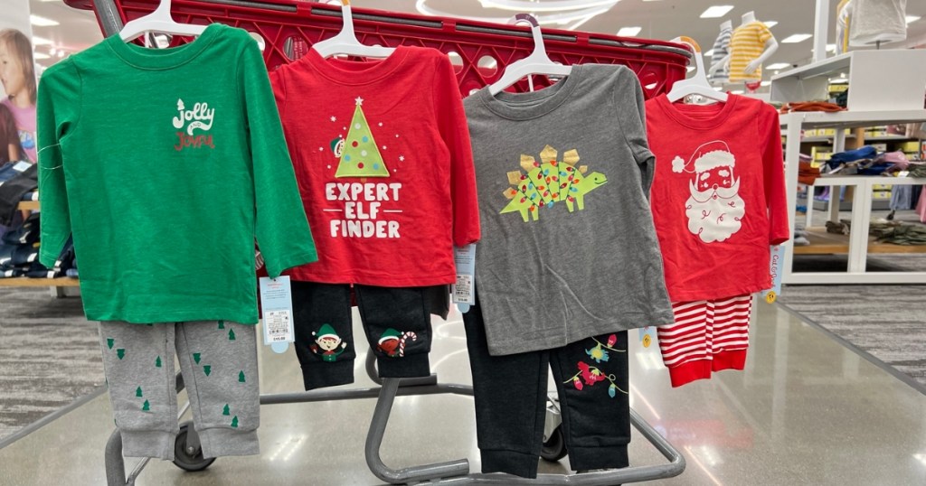 kids christmas pajamas hanging from target cart