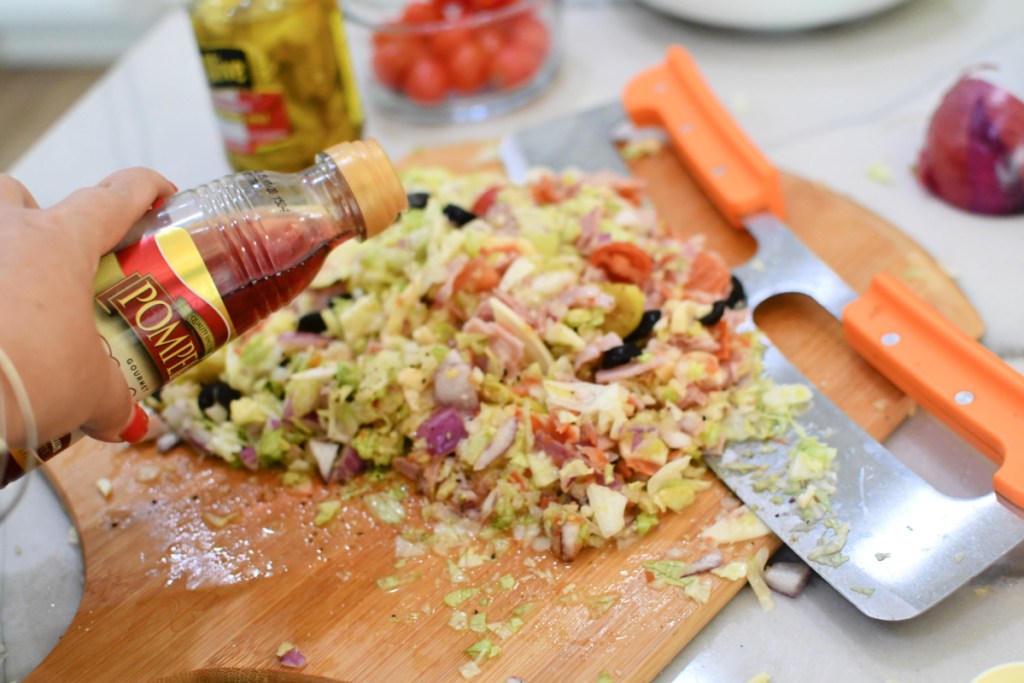 adding red wine vinegar to italian chopped sub