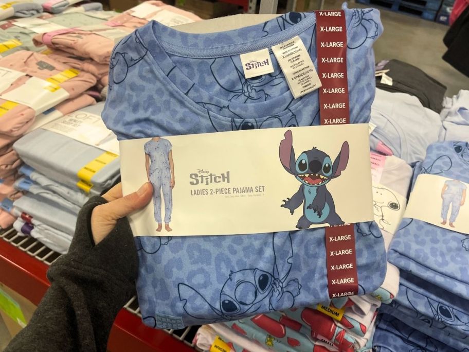 hand holding up stitch pj set 