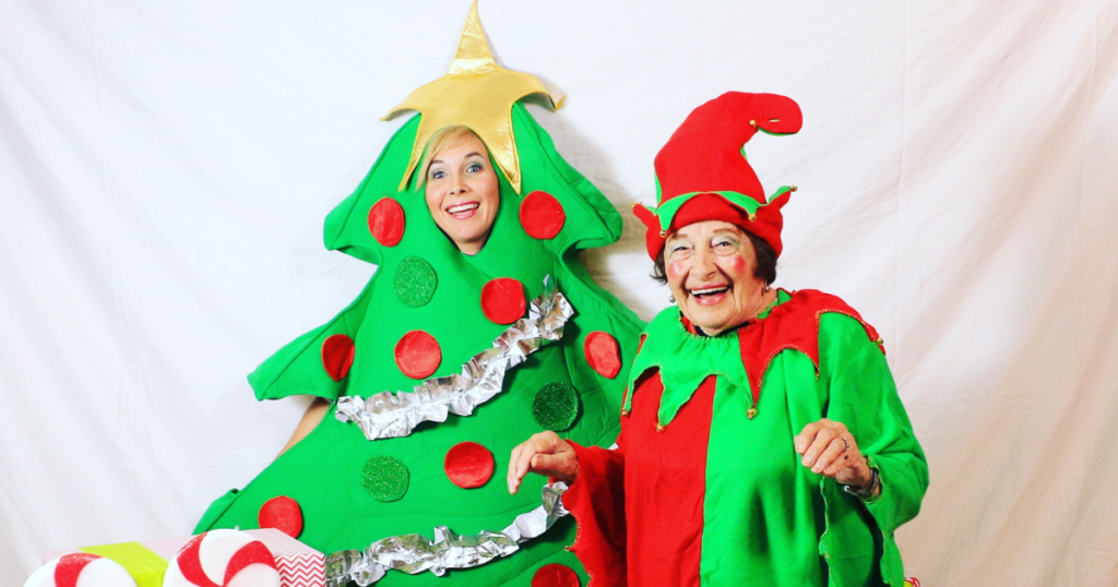 Collin and Ma wearing Christmas costumes 